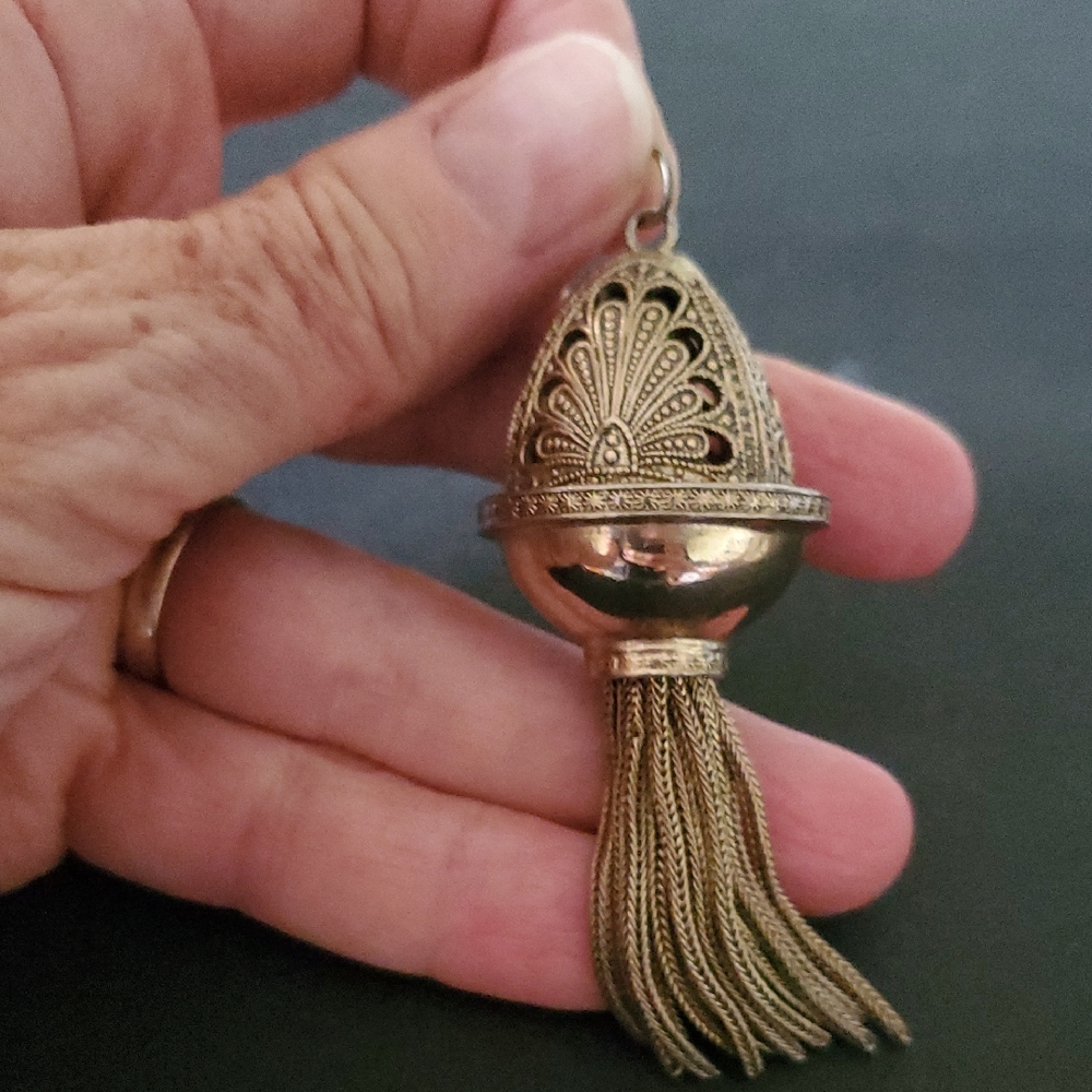 Elegant Golden Tassel Filigree Pendant